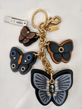 Coach Denim Butterfly Cluster Bag Charm C8224 Blue Gold Keychain